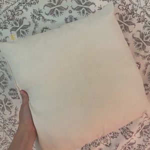Neutral throw pillow